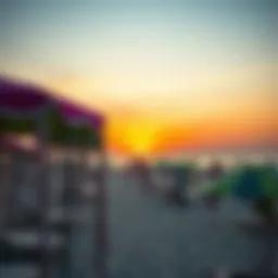 Vibrant sunset over La Mer Beach with colorful umbrellas